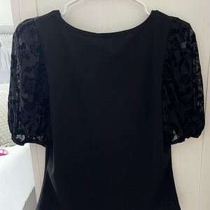 Size medium suit top with velvet sleeves.